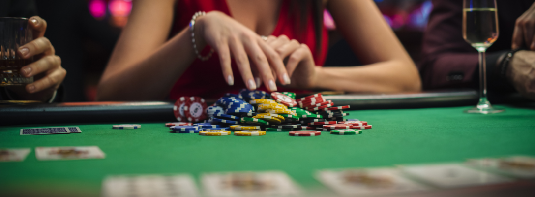 Woman at Las Vegas Casino Table with Poker Chips
